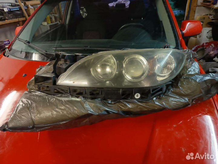 Фара mazda 3 2005