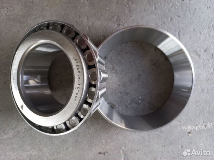 Роликовый подшипник ступицы наружный 33213