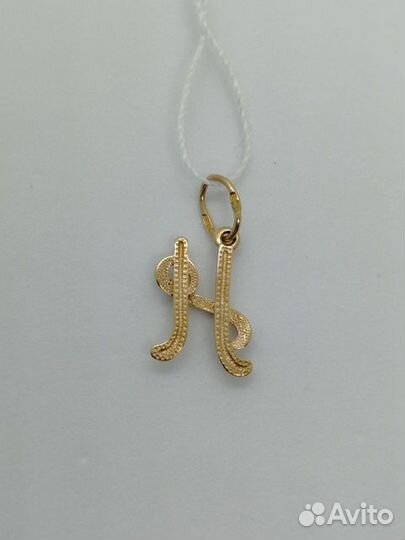 Золотая подвеска с камнем