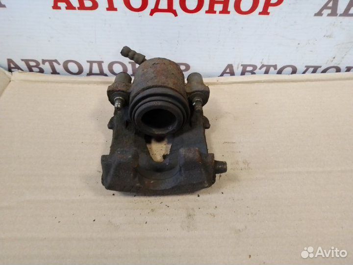 Суппорт тормозной передний левый Skoda Fabia 2