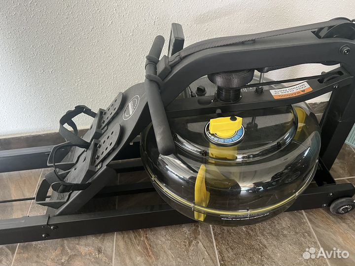 Гребной тренажер