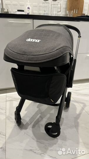 Коляска автокресло doona