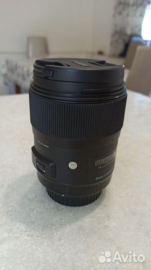 Объектив Sigma 35mm 1.4 art canon