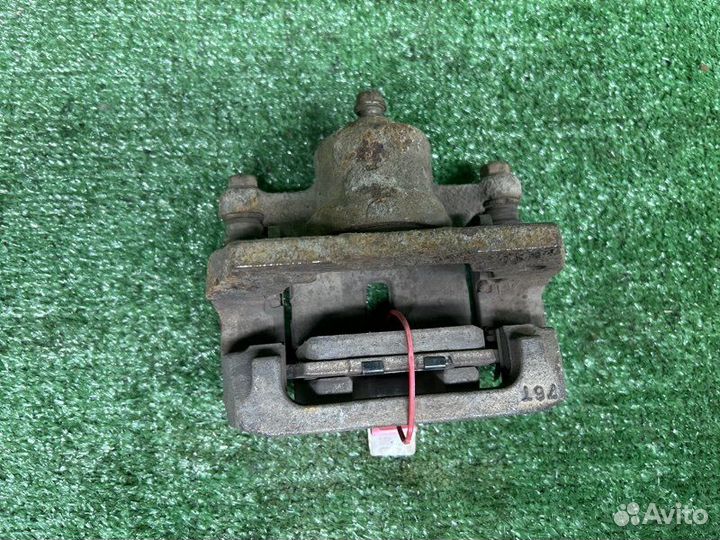 Тормозной суппорт задний правый Mazda Сх7