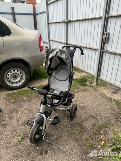 Детский трехколесный велосипед с ручкой