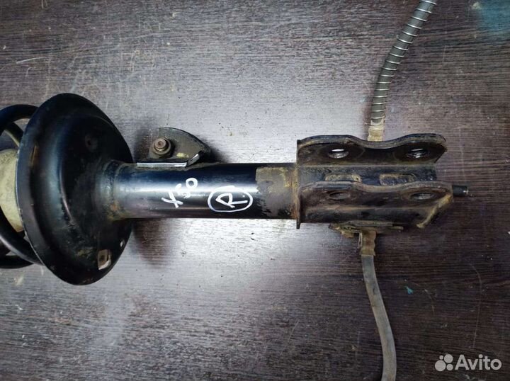 Стойка амортизатора передняя Lifan X50