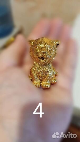 Фигурки тигров, львов