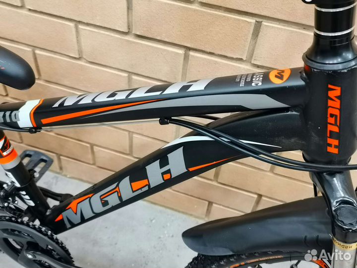 Велосипед на литых дисках 24 дюйма,чёрно-оранжевый