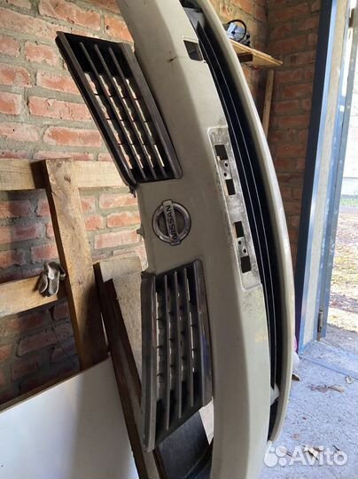 Передний бампер nissan tiida latio