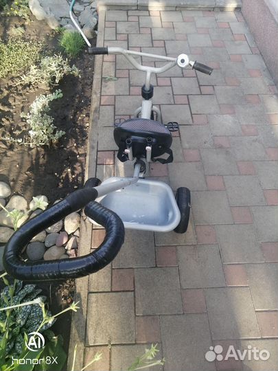 Трехколесный велосипед с ручкой