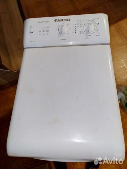 Стиральная машина с вертикальной загрузкой