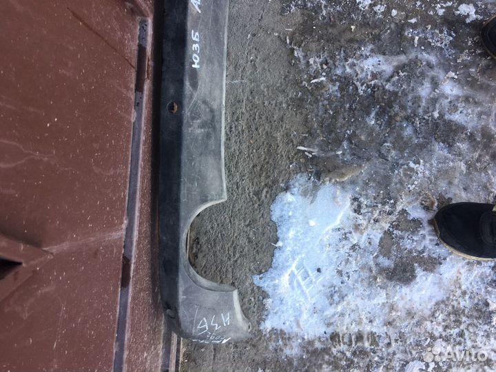 Юбка заднего бампера Opel Astra j седан