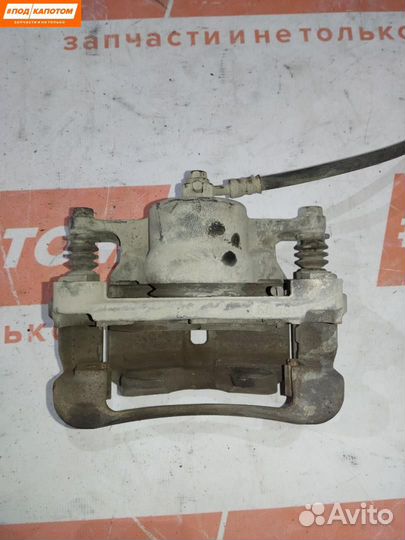 Суппорт тормозной передний правый Nissan X-Trail