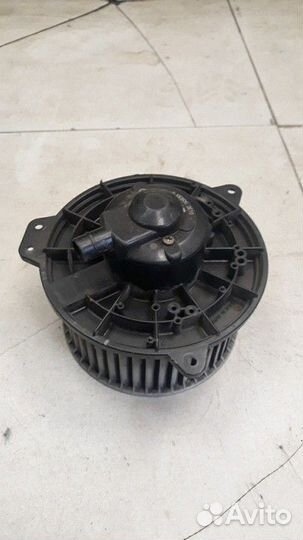 Моторчик отопителя Mazda 323