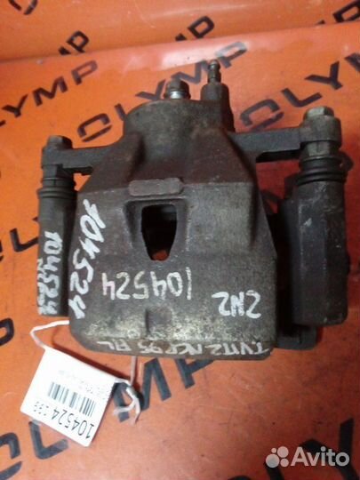 Суппорт передний левый Toyota Vitz NCP95 2NZ-FE