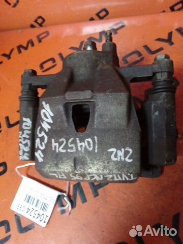 Суппорт передний левый Toyota Vitz NCP95 2NZ-FE