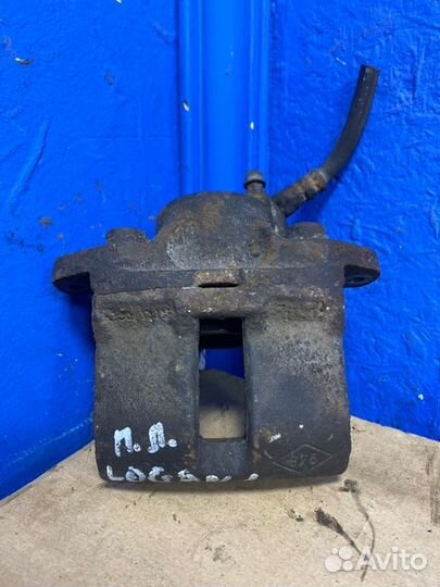 Суппорт тормозной передний левый Renault Logan