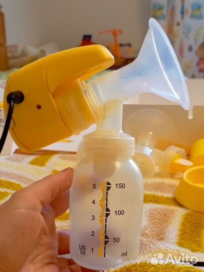 Молокоотсос medela электрический