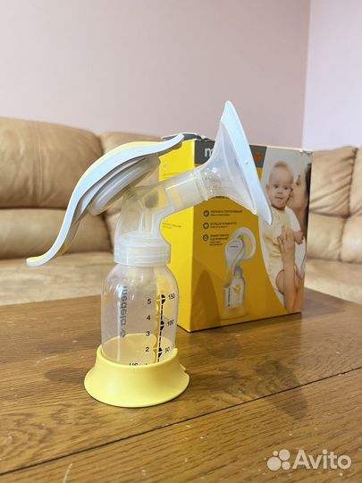 Молокоотсос medela ручной