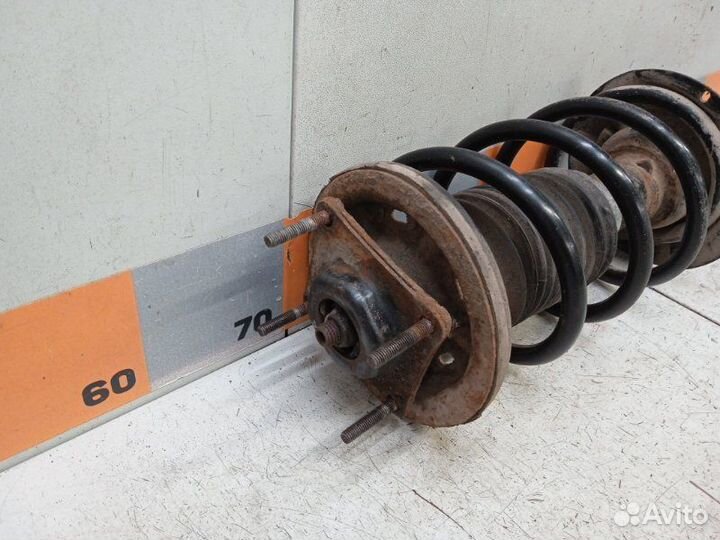 Амортизатор передний левый Mazda Tribute 3.0 2003