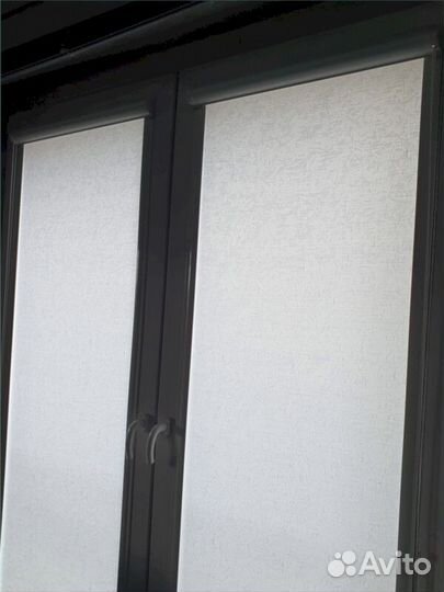 Рулонная штора на окно