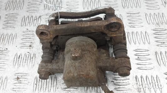 Суппорт тормозной задний правый toyota corolla E12