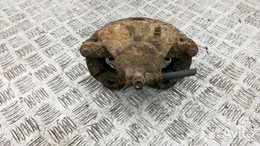 Суппорт тормозной передний правый nissan primera P