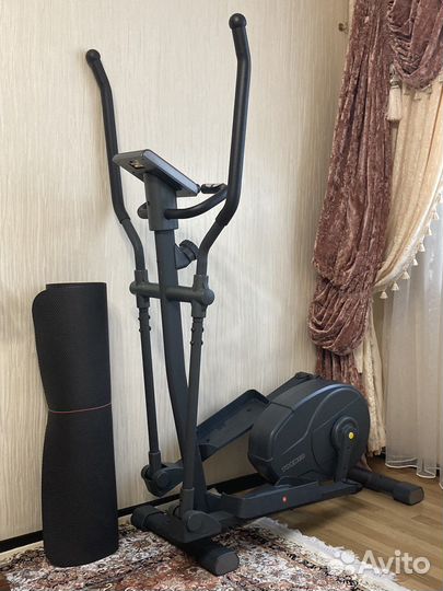 Эллиптический тренажёр torneo