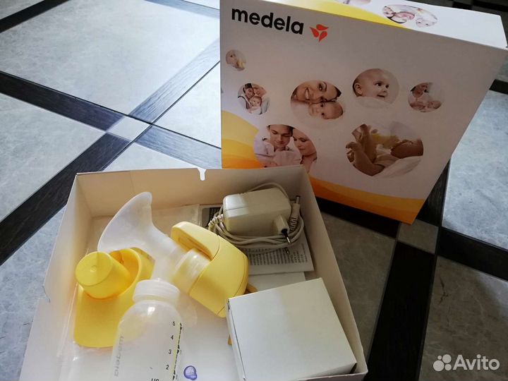 Молокоотсос medela mini электрический