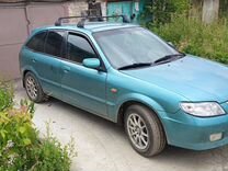 Mazda 323 1.6 MT, 2002, 382 000 км, с пробегом, цена 340 000 руб.