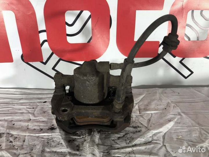 Суппорт тормозной передний правый Opel Corsa D