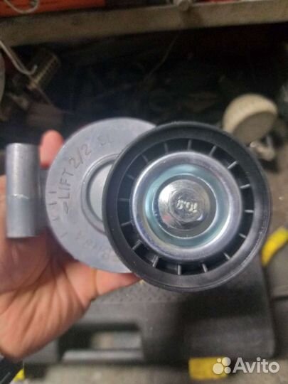 Натяжной ролик