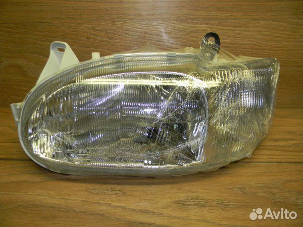 Фара левая Ford Escort/Orion 1995-2001
