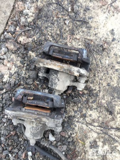 Суппорт тормозной задний Kia Sportage 4