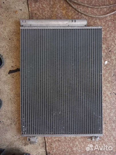 Радиатор кондиционера Рено логан 2