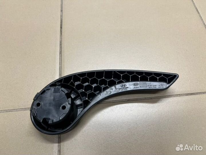 Ручка регулировки спинки сиденья передняя левая