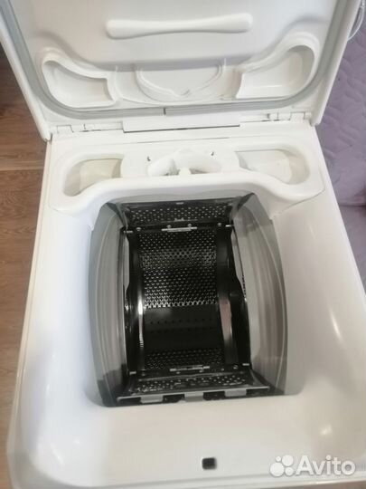 Стиральная машина с вертикальной загрузкой