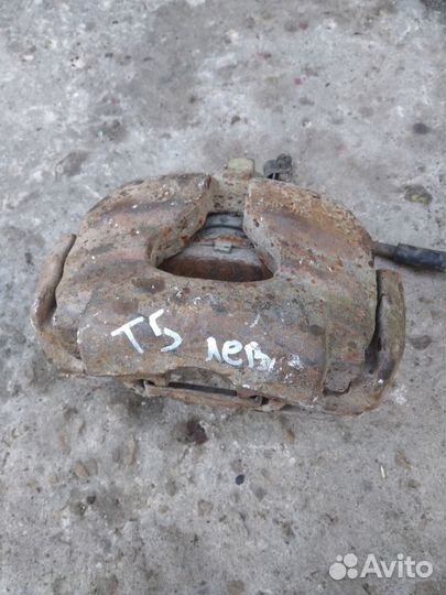 Тормозной суппорт передний левый Volkswagen