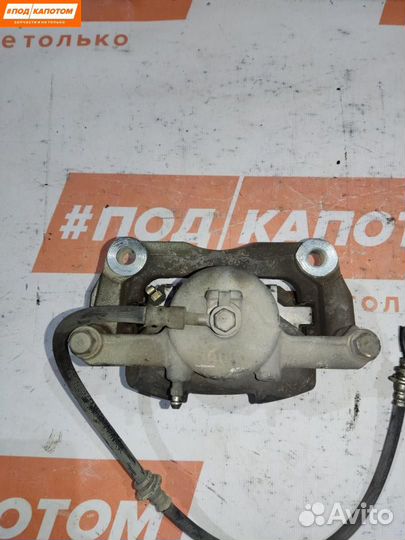 Суппорт тормозной передний правый Nissan X-Trail