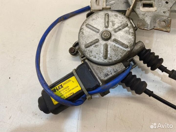 Мотор стеклоподъемника задний правый Kia Spectra