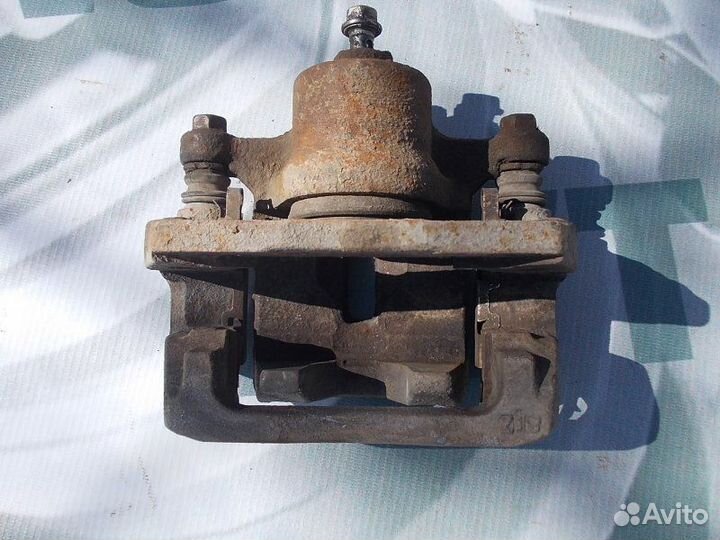 Суппорт тормозной задний левый Mazda Cx-7 2.3 2008