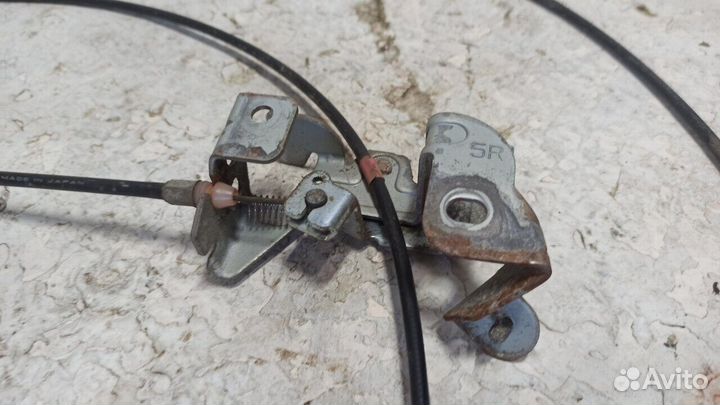 Трос лючка бензобака Mazda Familia S-Wagon 1998-2004г