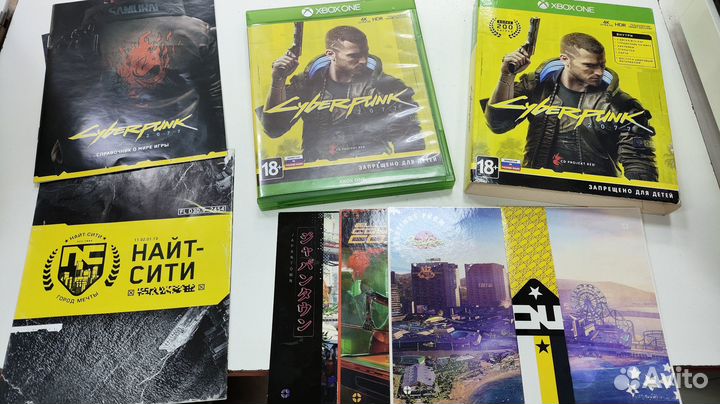 Диски с игрой Cyberpunk 2077 Steelbook