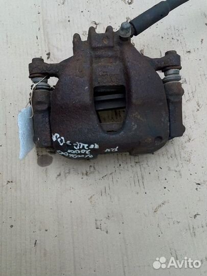 Суппорт тормозной передний левый Peugeot 308