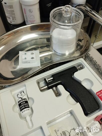 Прокол ушей пистолетом