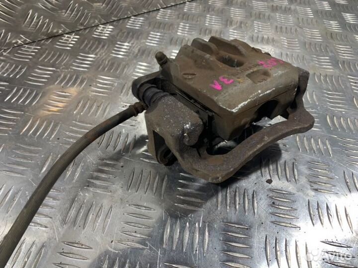 Суппорт задний левый Subaru Xv GP