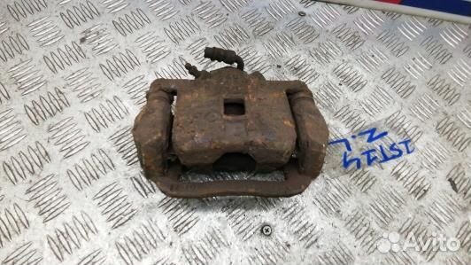 Суппорт тормозной задний левый subaru legacy 3 (2S