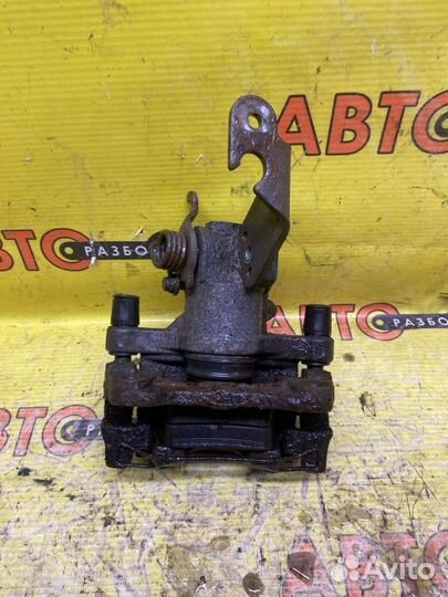 Суппорт задний правый Nissan Primera P12 QG18DE