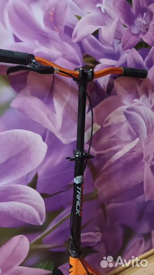 Самокат Novatrack Polis 200с ручным тормозом