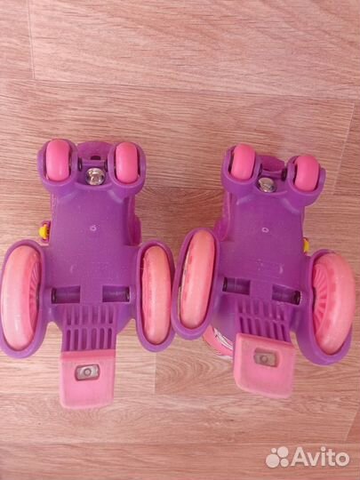 Коньки роликовые